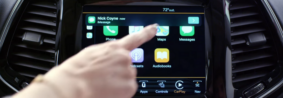 Screenshot of driver using Apple CarPlay in Jeep