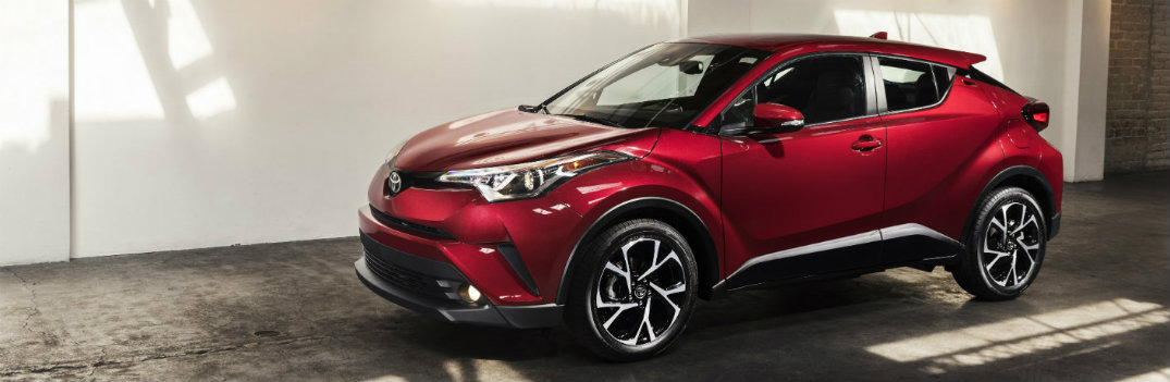 2018 Toyota C-HR red exterior shot concrete wall