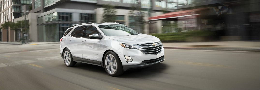 2018 Chevrolet Equinox driving down a city street