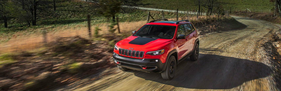 2019 Jeep Cherokee Red Outside Action Shot