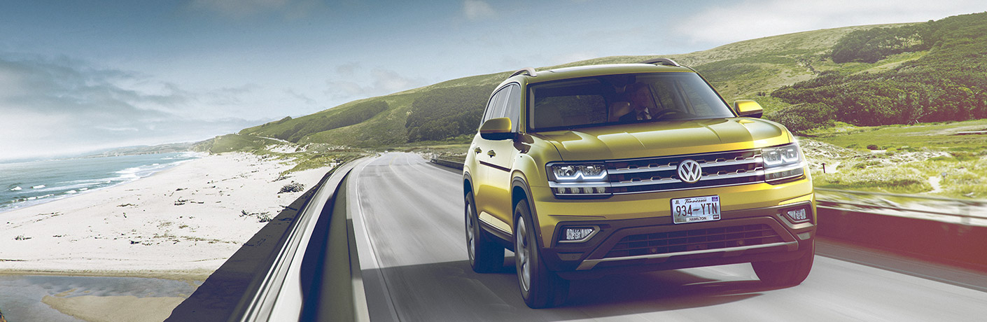 2018 Volkswagen Atlas driving next to the ocean