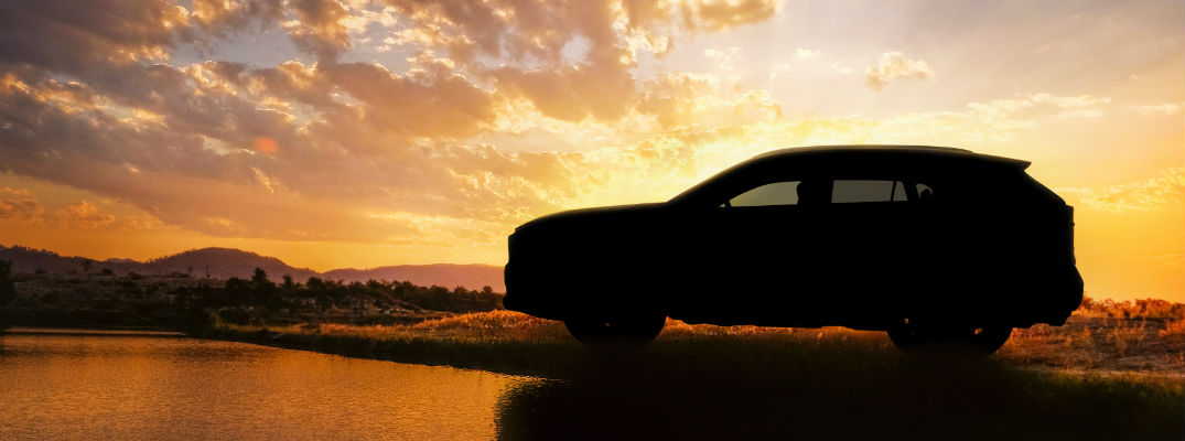 A teaser photo showing the 2019 Toyota RAV4 in silhouette.