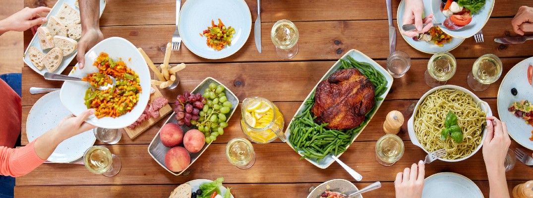 A stock photo of a table set for a Thanksgiving meal.