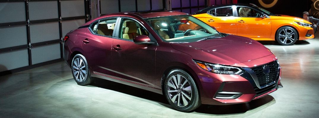 Exterior view of the front of a maroon 2020 Nissan Sentra at the LA Auto Show