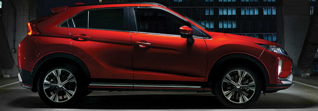 Exterior side view of a red 2018 Mitsubishi Eclipse Corss