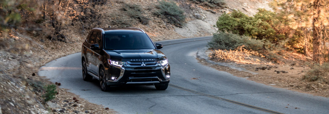 Front exterior view of a black 2018 Mitsubishi Outlander PHEV