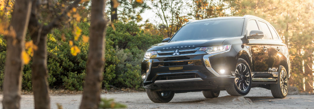 Front exterior view of a black 2018 Mitsubishi Outlander PHEV