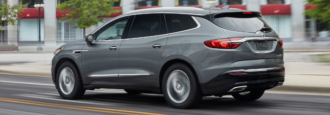 2019 Buick Enclave exterior back fascia and drivers side going fast on road