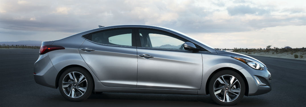 2015 Hyundai Elantra Sedan Passenger Side Profile with Clouds