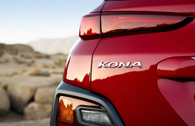 2020 Hyundai Kona red exterior close up shot of driver side rear Kona badging