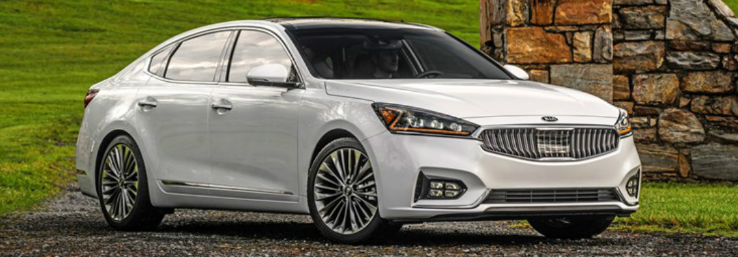 2018 Kia Cadenza in white sitting on a gravel driveway