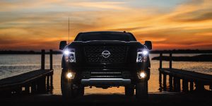 2018 Nissan TITAN Front View of Black Exterior with sunset background