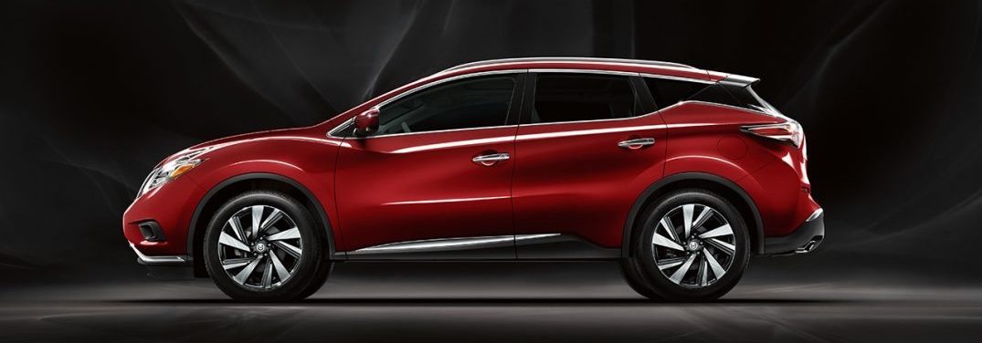 Side profile of the 2018 Nissan Murano in a dark room