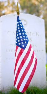 Small American Flag in Front of Grave