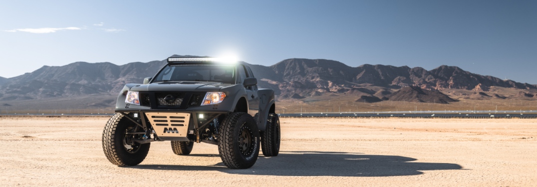 nissan frontier desert runner in the desert with overhead lights on