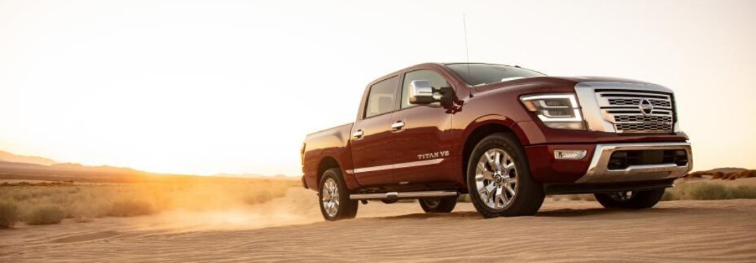 2020 Nissan Titan driving through sand