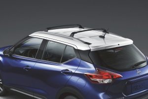 Blue 2020 Nissan Kicks showing white roof from exterior drivers side rear