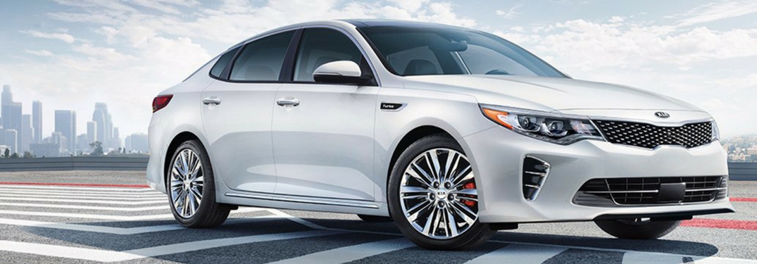 2018 kia optima full view parked in the city