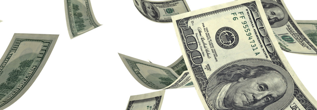Giant hundred-dollar bills fall from above on a white background.