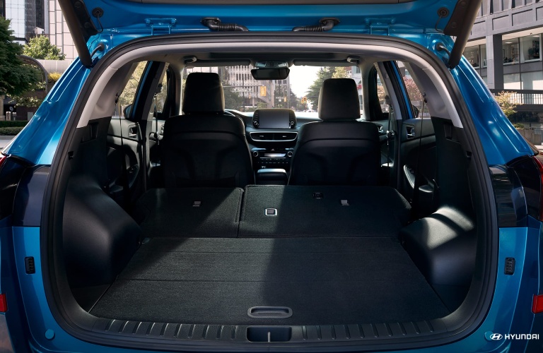 Gaping cargo maw of a blue 2020 Hyundai Tucson.