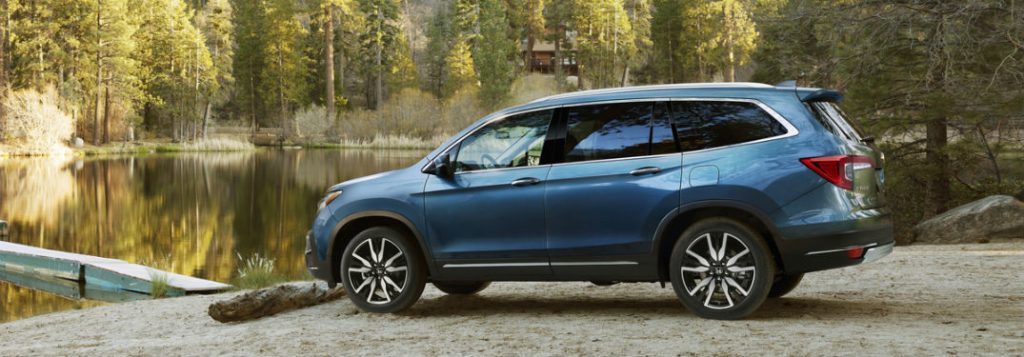 2019 honda pilot side view by water