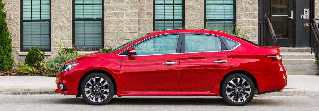 side view of a red 2019 Nissan Sentra