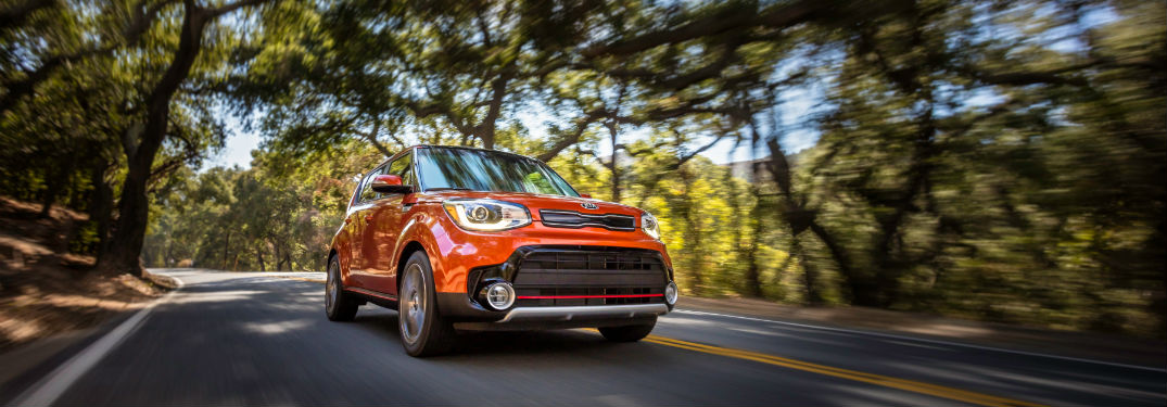 2018 Kia Soul Exterior Front Fascia Passenger side on Road with blurred trees