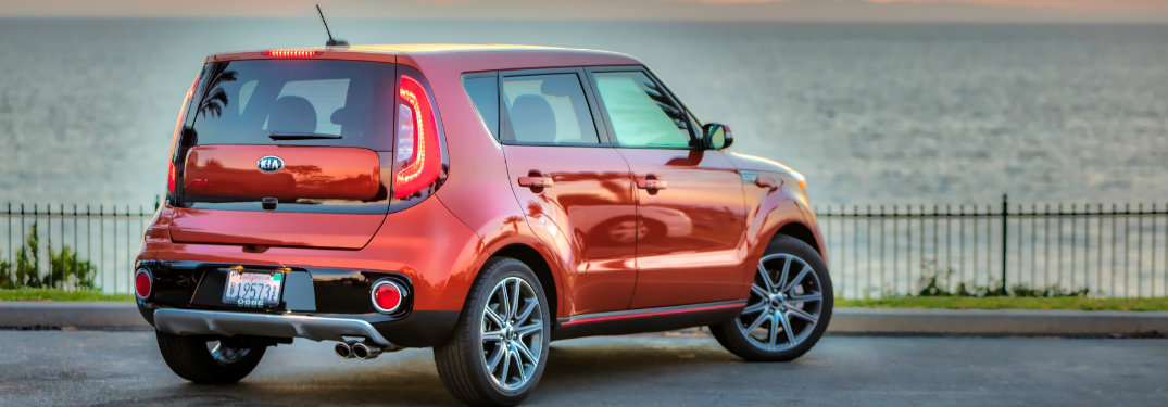 rear view of orange kia soul