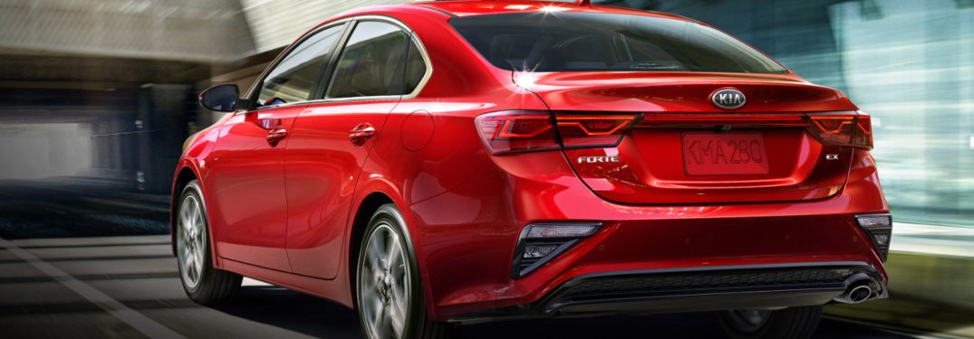 2021 Kia Forte Red driving through a tunnel in Dayton, OH