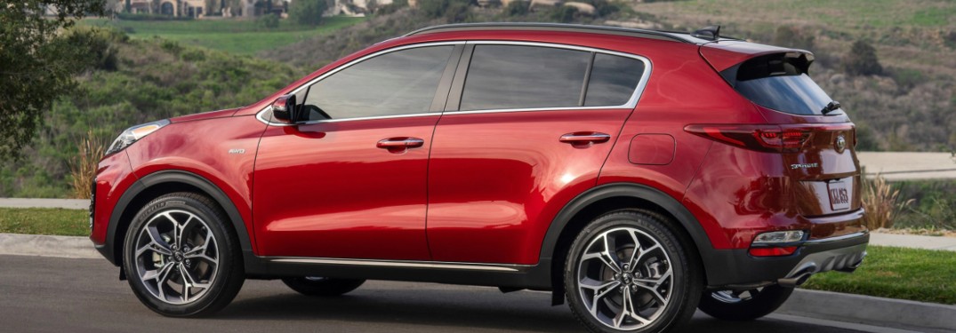 2022 Kia Sportage driving down a highway road