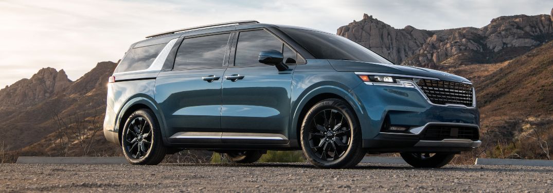 2022 Kia Carnival parked on a rural road