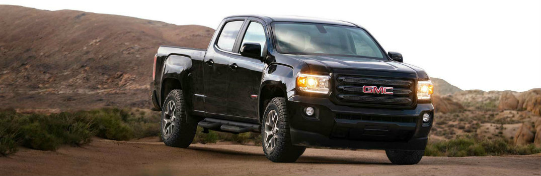 2018 GMC Canyon black on dirt road offroading