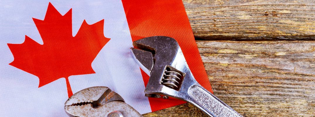 Wrench on top of Canadian flag to symbolize Labour Day