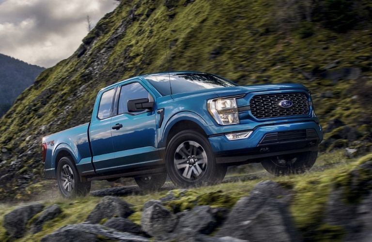 2021 Ford F-150 driving on a hill
