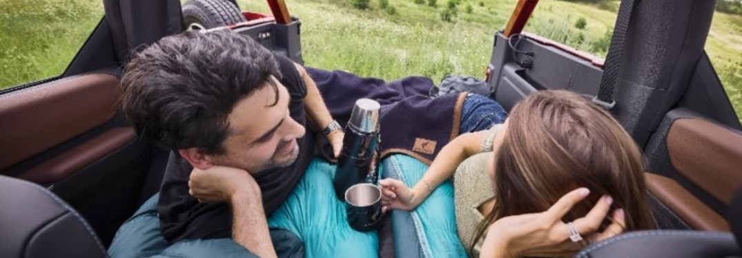 two people in the cargo space of a 2021 Ford Bronco