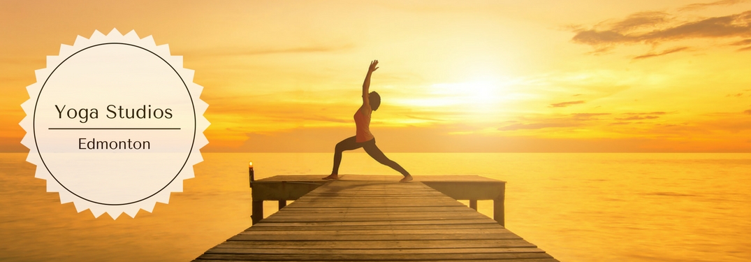 Yoga Studios Edmonton and a Woman Doing a Yoga Pose on a Dock