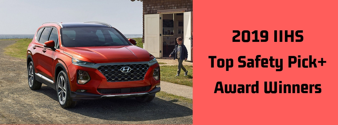 Image of a red 2019 Hyundai Santa Fe to the right of black font against a red background stating "2019 IIHS Top Safety Pick+ Award Winners"