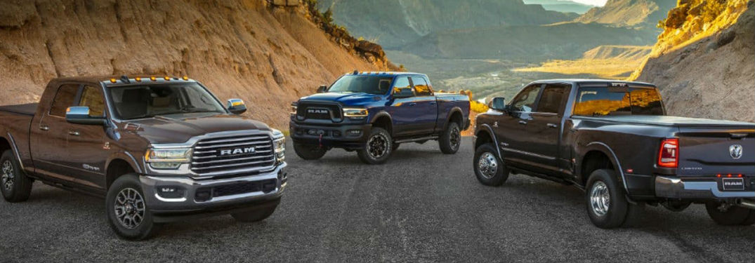Three Ram 2500 pickup trucks parked next to each other
