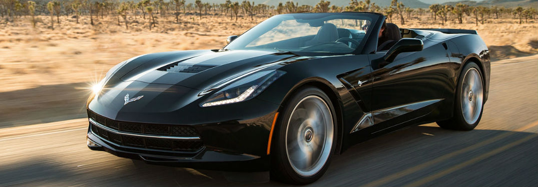 Chevy Corvette driving on a road