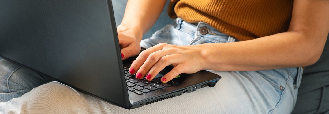Close up of a woman on her laptop