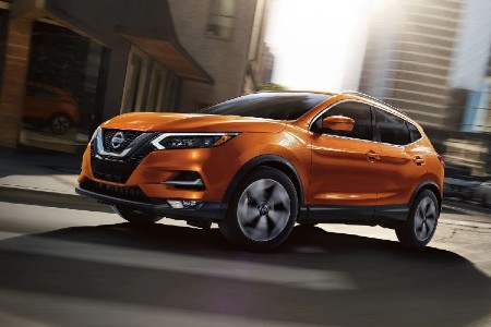 Front driver angle of an orange 2020 Nissan Rogue Sport