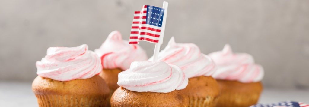 Cupcakes with an American flag decoration on top of one