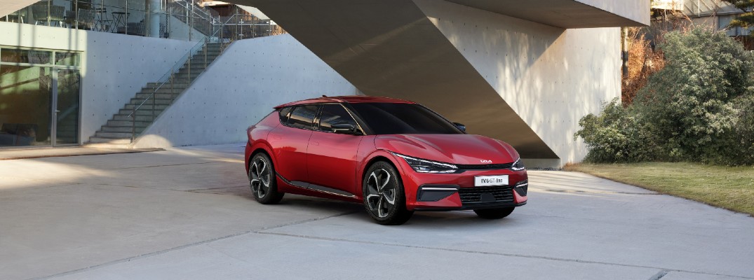 the new Kia EV6 parked near a building.