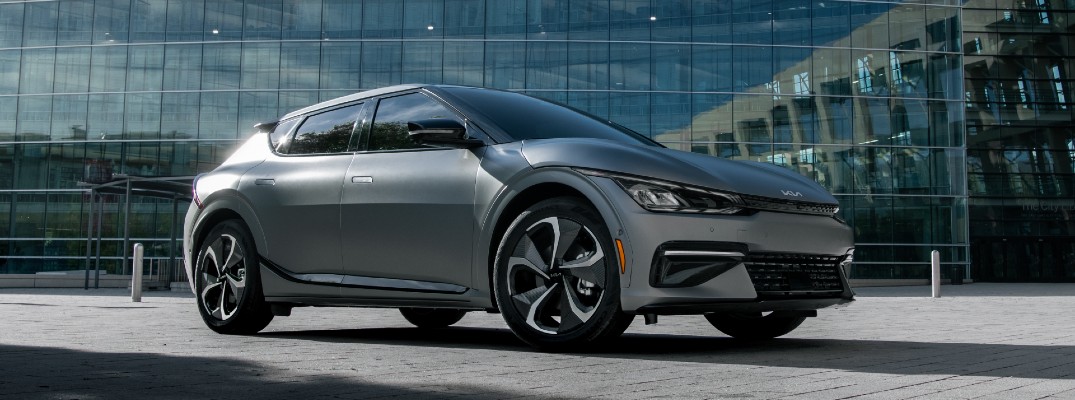 The 2022 Kia EV6 parked in front of a building.