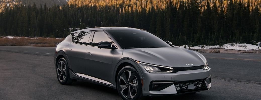 2022 Kia EV6 on the road with mountain backdrop