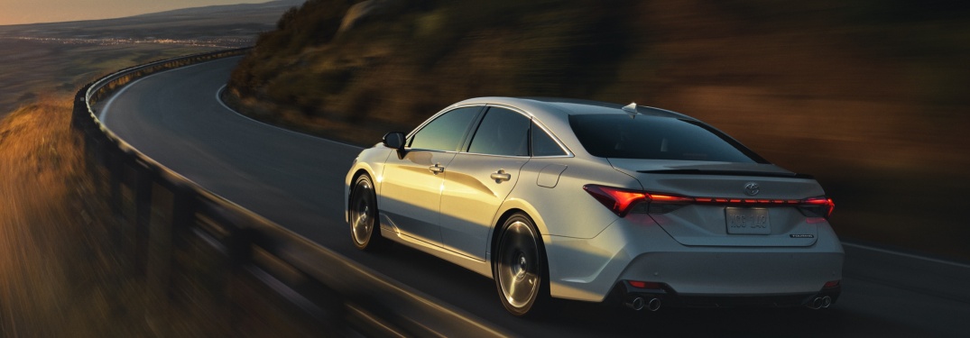 2019 Toyota Avalon driving on a curving mountain road