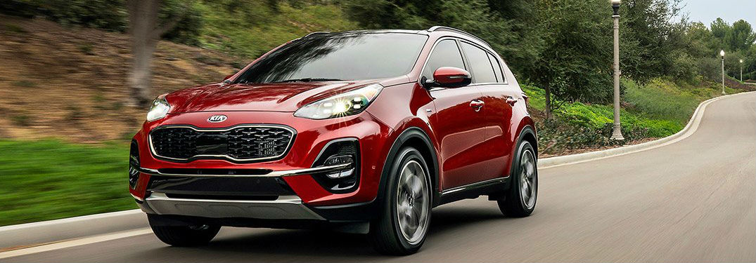 2021 Kia Sportage driving on a road