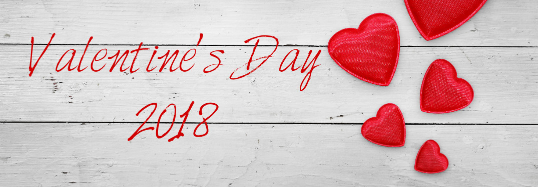 fabric hearts on a white piece of food with text saying Valentine's Day 2018