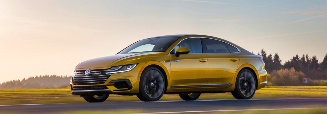 2019 Volkswagen Arteon driving on a road at sunset