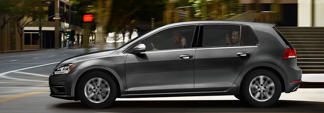 2019 Volkswagen Golf Sport at a city intersection